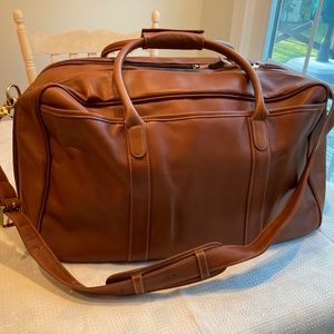 COACH leather carry on duffle bag.